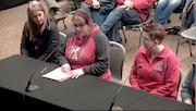 Silver Falls Education Association president Lori Wyer speaks to the school board last week after news that the district could be out of money to make its payroll by June. The district's superintendent resigned two days later.