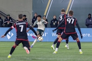 Portland Timbers forward Antony (#11) with a cross during an MLS match against D.C. United  at Providence Park in Portland, Oregon on Saturday, March 2, 2024.