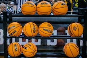 A rack of basketballs on the court before the Oregon Ducks men face the UC Irvine Anteaters in a first-round NIT college basketball game at Matthew Knight Arena in Eugene, Oregon on Wednesday, March 15, 2023.