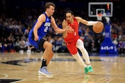 Dalano Banton (5) of the Portland Trail Blazers drives on  Franz Wagner (22) of the Orlando Magic at Kia Center on Monday, April 1, 2024, in Orlando, Florida. (Mike Ehrmann/Getty Images/TNS) TNS