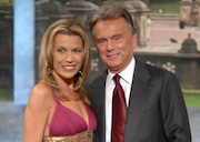 FILE - In this Sept. 29, 2007 file photo, co-host Vanna White and host Pat Sajak make an appearance at Radio City Music Hall for a taping of celebrity week on "Wheel of Fortune" in New York. Sajak had to have emergency surgery, and his longtime sidekick Vanna White is filling in as host while he recovers. The show says on its social media accounts that the Thursday. Nov. 7, 2019, taping was canceled as the 73-year-old Sajak underwent successful emergency surgery to correct a blocked intestine.  (AP Photo/Peter Kramer, file)