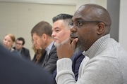 School board chair Gary Hollands, in foreground, with former Portland Public Schools Superintendent Guadalupe Guerrero. Hollands is calling for full transparency in the search for Guerrero's successor. (Beth Conyers/Portland Public Schools)