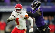 Kansas City Chiefs wide receiver Rashee Rice (4) is tackled by Baltimore Ravens linebacker Patrick Queen (6) during the first half of the AFC Championship NFL football game, Sunday, Jan. 28, 2024, in Baltimore.