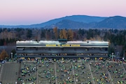 The view of Autzen Stadium’s north side as the sun sets before the No. 6 Oregon Ducks face the No. 16 Oregon State Beavers in a college football game in Eugene, Oregon on Saturday, Nov. 24, 2023. 