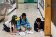Students at Boise-Eliot-Humboldt K-5 work together during the school's recent literacy night. A recent poll conducted for Portland Public Schools suggests that voters were willing to maintain — but not raise — a property tax levy on behalf of the district.