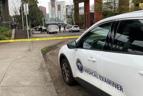 Multnomah County Medical Examiner SUV parked near the site of a homicide