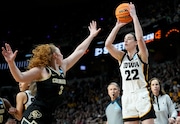 Iowa guard Caitlin Clark (22) shoots against Colorado guard Frida Formann (3) during the second quarter of a Sweet Sixteen round college basketball game during the NCAA Tournament, Saturday, March 30, 2024, in Albany, N.Y. (AP Photo/Mary Altaffer)
