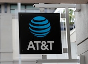 The sign in front of an AT&T retail store is seen in Miami, July 18, 2019. The theft of sensitive information belonging to millions of AT&T’s current and former customers has been recently discovered online, the telecommunications giant said Saturday, March 30, 2024. In an announcement addressing the data breach, AT&T said that a dataset found on the dark web contains information including some Social Security numbers and passcodes for about 7.6 million current account holders and 65.4 million former account holders.