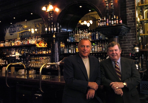 Doug Schmick, left, and William McCormick, co-founders of the McCormick & Schmick's restaurants, after celebrating its first anniversary of taking their company public.