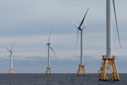 The five turbines of Block Island Wind Farm operate, Thursday, Dec. 7, 2023, off the coast of Block Island, R.I., during a tour organized by Orsted. (AP Photo/Julia Nikhinson)