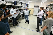 Intel CEO Bob Swan, center, inside one of the company's Oregon engineering labs. The chipmaker designed and built its new Tiger Lake processor in Hillsboro.