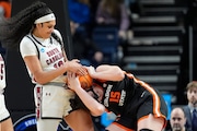 South Carolina center Kamilla Cardoso (10) battles for control of a rebound against Oregon State forward Raegan Beers (15) during the second quarter of an Elite Eight round college basketball game during the NCAA Tournament, Sunday, March 31, 2024, in Albany, N.Y. (AP Photo/Mary Altaffer)