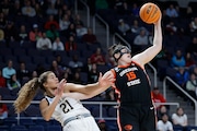 Raegan Beers (15) of the Oregon State Beavers competes for the ball against Maddy Westbeld (21) of the Notre Dame Fighting Irish during the first half in the Sweet 16 round of the NCAA women's basketball tournament at MVP Arena on March 29, 2024, in Albany, New York. (Photo by Sarah Stier/Getty Images)