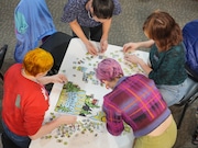 The “Speech Language Puzzolgists (and Claire)” team came in first place during the speed puzzling competition Feb. 7 at Portland Puzzle Company.