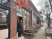 George Johnson stands in the door of Pizza Annex on Northeast Alberta Street. Assembly Brewing of Southeast Portland on Friday, Feb. 9, 2024, opens its Pizza Annex on Northeast Alberta Street.