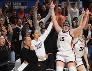 Oregon State forward Raegan Beers (15) celebrates a 3-point basket from the bench next to head coach Scott Rueck, left, during the second half of a second-round college basketball game in the women's NCAA Tournament against Nebraska in Corvallis, Ore., Sunday, March 24, 2024. Oregon State won 61-51. (AP Photo/Mark Ylen)