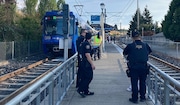 Police investigate a Saturday-night stabbing that left two 17-year-olds injured at the MAX platform at 9598 S.E. Flavel Street.