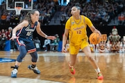 USC guard JuJu Watkins (#12) sets up the offense as the Trojans face the UConn Huskies in the Elite Eight of the NCAA women’s tournament at the Moda Center in Portland, Oregon on Monday, April 1, 2024.