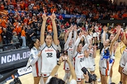 Oregon State Beavers players celebrate after their 73-51 win over the Eastern Washington Eagles in a first-round women’s NCAA Tournament game on Friday, March 22, 2024, at Gill Coliseum in Corvallis.