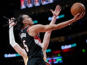 Portland Trail Blazers guard Dalano Banton (5) goes in for a basket against the Atlanta Hawks during the second half of an NBA basketball game Wednesday, March 27, 2024, in Atlanta. (AP Photo/John Bazemore) AP