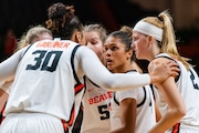 Guard Donovyn Hunter (4) of the Oregon State Beavers looks on in a group huddle during the first half of the season opener basketball game against the University of Arkansas at Pine-Bluff Lions on Monday, Nov. 6, 2023, at Gill Coliseum in Corvallis.