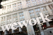 The WeWork logo is seen at one of the company's offices, Jan. 16, 2020, in New York. WeWork expects to emerge from bankruptcy by the end of May 2024, the embattled co-working space provider said this week, as the company pointed to lease restructuring efforts set to bring in an estimated $8 billion in future rental savings. In an update Tuesday, April 2, 2024, WeWork said it had “determined a final path forward” 90% of the locations in the company's global real estate portfolio.
