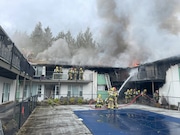 Tualatin Valley Fire & Rescue firefighters extinguishing a blaze at the Westview Terrace apartment complex March 25, 2024.